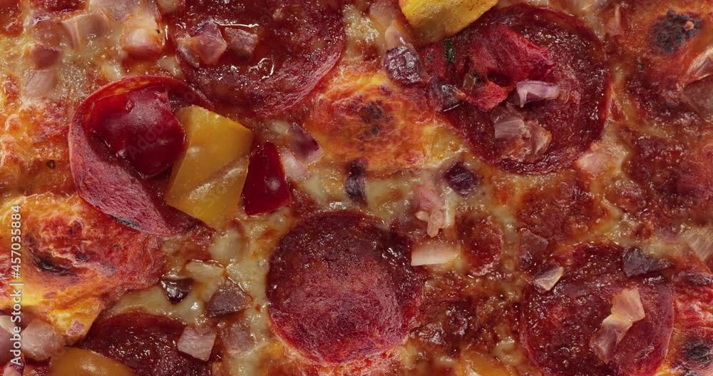 Pizza cloeup spinning with hot steam Pizza cloeup spinning with hot steam