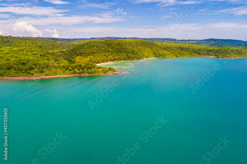 Exotic sea beach island turquoise water with tropical green tree forest