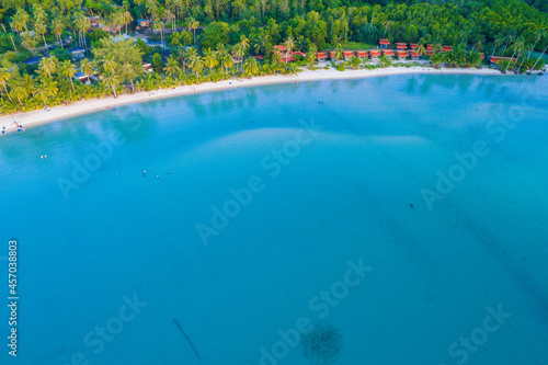 Exotic sea beach island turquoise water with tropical green tree forest © themorningglory