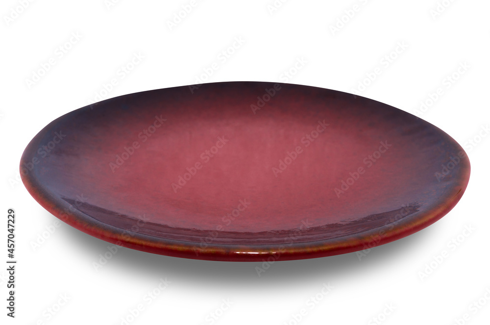 Red circle ceramics plate isolated on white background. Red circle ceramics plate isolated on white background.