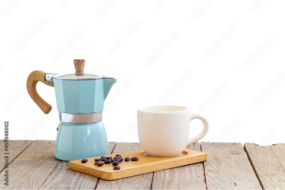 Moka pot coffee maker and coffee cup on wood table Moka pot coffee maker and coffee cup on wood table