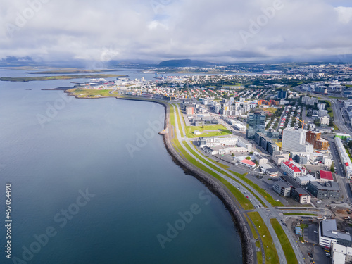Beautiful aerial view of the City of Reykjavik  with its majestic church and colorful houses and streets in Iceland