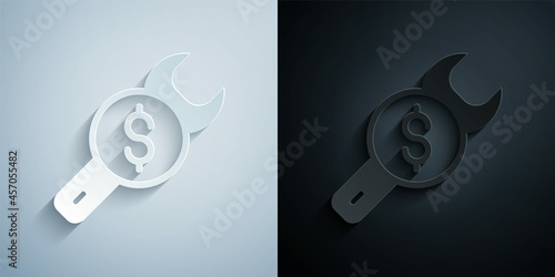 Paper cut Repair price icon isolated on grey and black background. Dollar and wrench. Paper art style. Vector