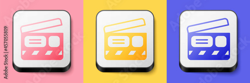 Isometric Movie clapper icon isolated on pink, yellow and blue background. Film clapper board. Clapperboard sign. Cinema production or media industry. Square button. Vector