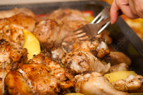 Cooking chicken meat with potatoes in the oven