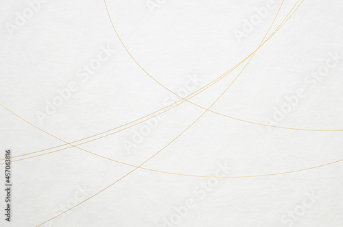 White washi paper texture with elegant gold leaf thread pattern. Abstract graceful Japanese style background.