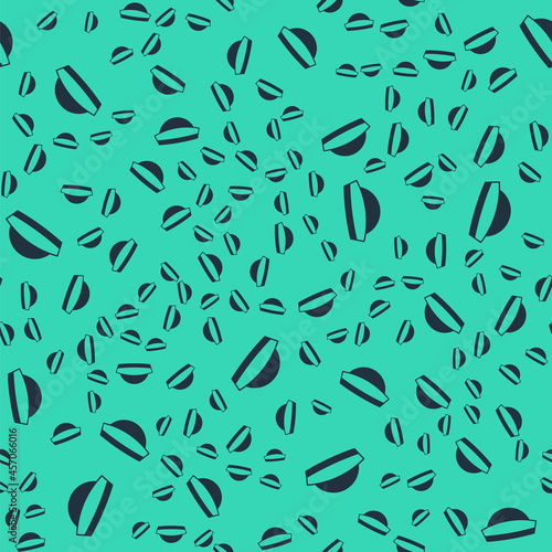 Black Sailor hat icon isolated seamless pattern on green background. Vector