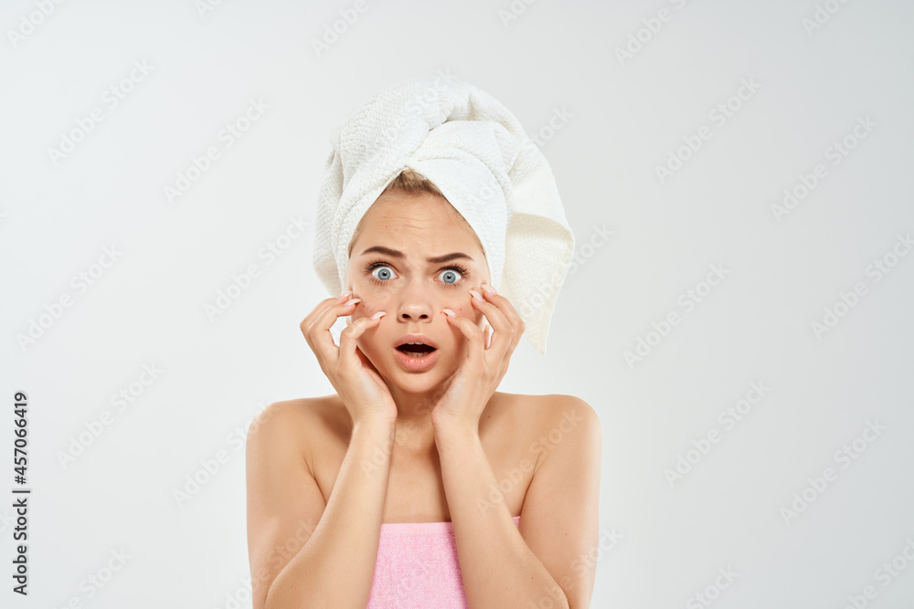 woman with a towel on my head acne on the face pimple Studio close-up woman with a towel on my head acne on the face pimple Studio close-up