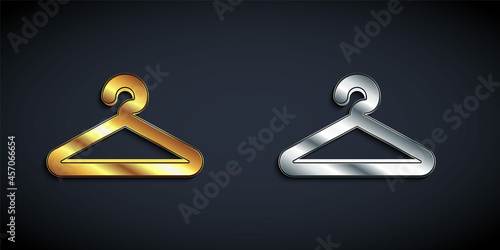 Gold and silver Hanger wardrobe icon isolated on black background. Cloakroom icon. Clothes service symbol. Laundry hanger sign. Long shadow style. Vector