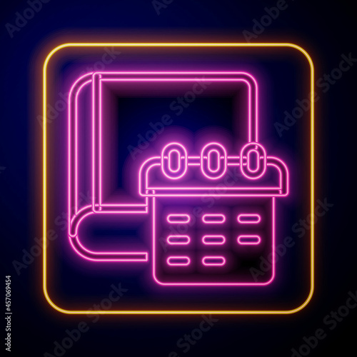 Glowing neon Daily paper notepad icon isolated on black background. Vector