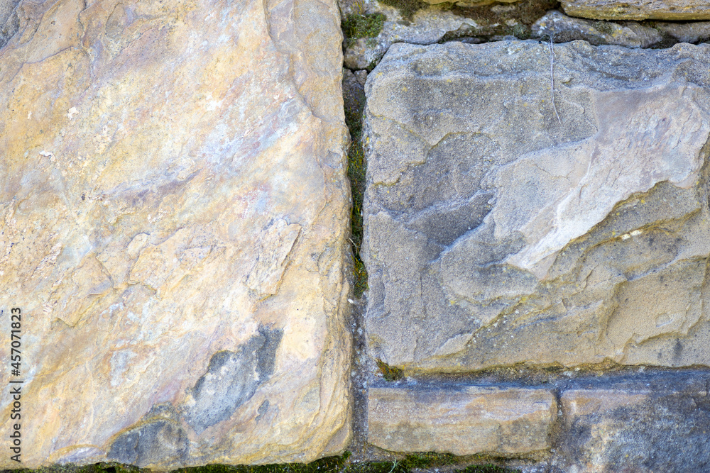 Fototapeta premium Rock wall with squares. Texture, background, backdrop