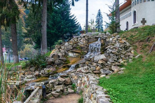 Waterfall in the central park of Slanic Moldova, Bacau, Romania
