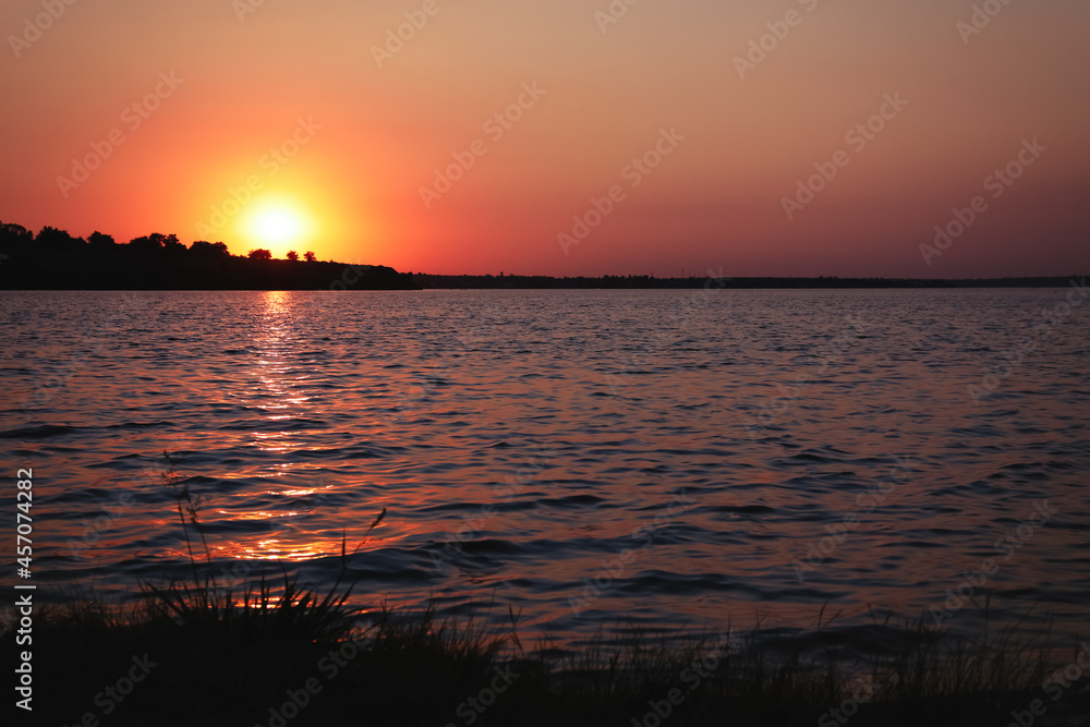 Amazing view of beautiful sunset on riverside