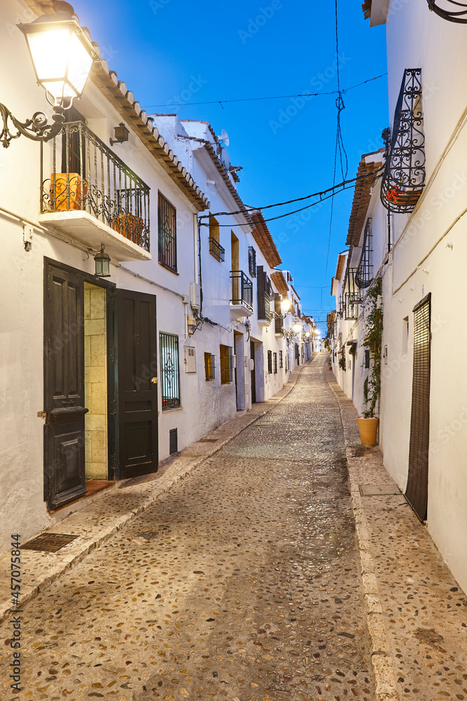Spanish mediterranean picturesque village of Altea. Traditional street at sunset
