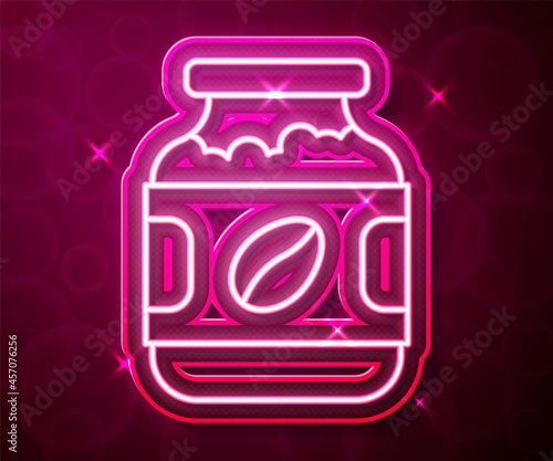 Glowing neon line Coffee jar bottle icon isolated on red background. Vector