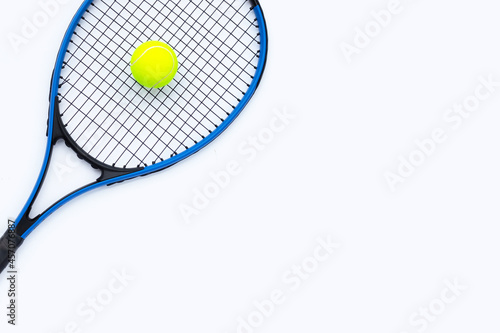Tennis racket with ball on white. © Bowonpat