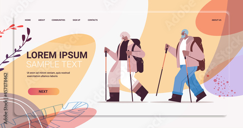 senior woman man hikers traveling with backpacks and sticks for walk nordic walking active old age concept