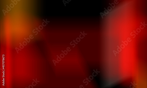 Abstract red-black background with blur. Red light glare on a black background with a