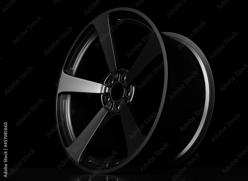 Obraz premium Sport black color car rim in dark scene 3D rendering car part wallpaper backgrounds