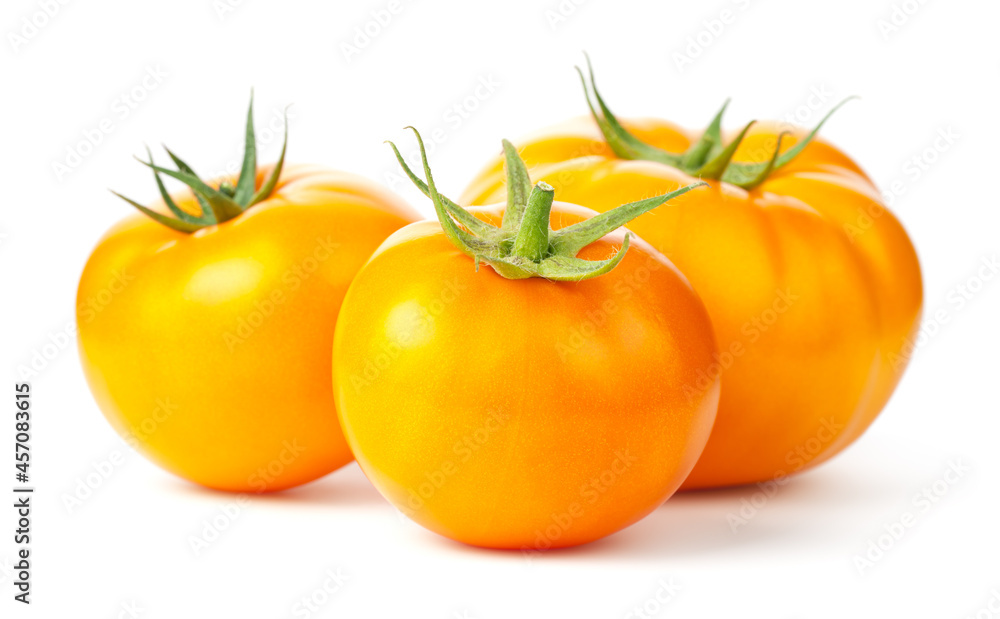 Three Yellow Tomatoes Isolated On White Background Three Yellow Tomatoes Isolated On White Background