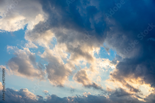 Fototapeta Naklejka Na Ścianę i Meble -  Fluffy cumulus clouds on blue sky background. Cloudscape white and grey color