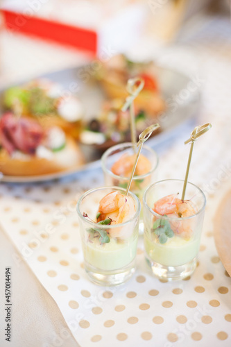 Shrimp cocktail at buffet table © Dina