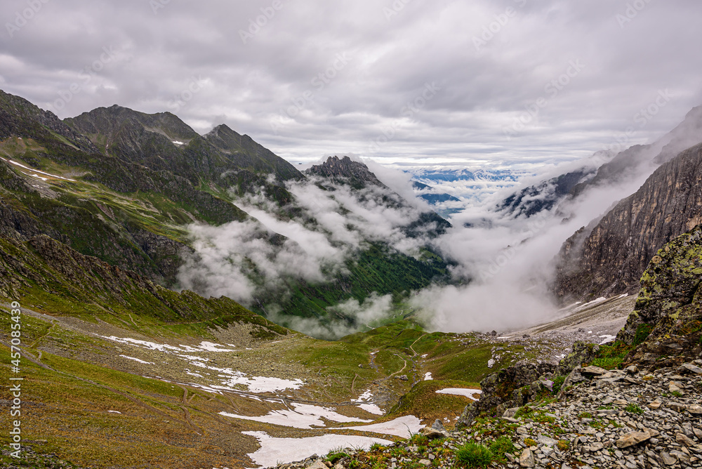 Pinnistal valley in Stubai Alps with the Elferspitze on the left in clouds.