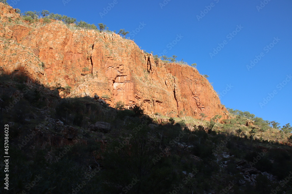Sunlight and shadow on the cliffs of Emma Gorge in the El Questro Wilderness Park in the East Kimberley region of Western Australia.