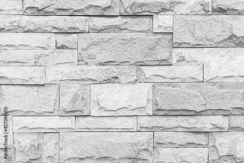 Rough surface white sandstone wall tiles texture and background seamless
