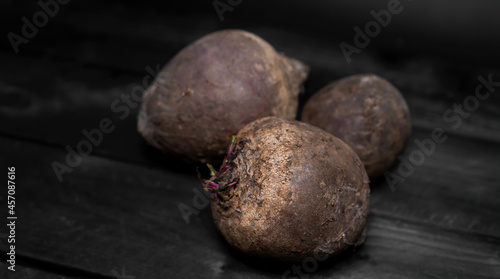 Beet fruits on wooden background