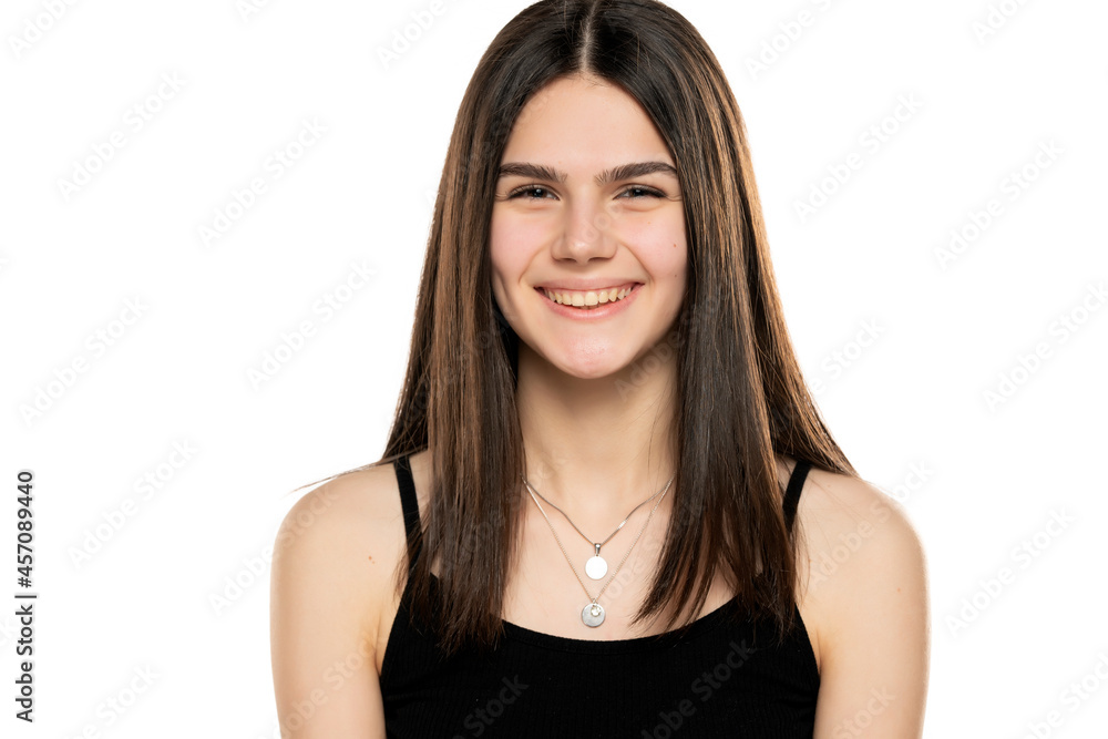portrait of a beautiful smiling teenage girl with long straight hair and no makeup portrait of a beautiful smiling teenage girl with long straight hair and no makeup