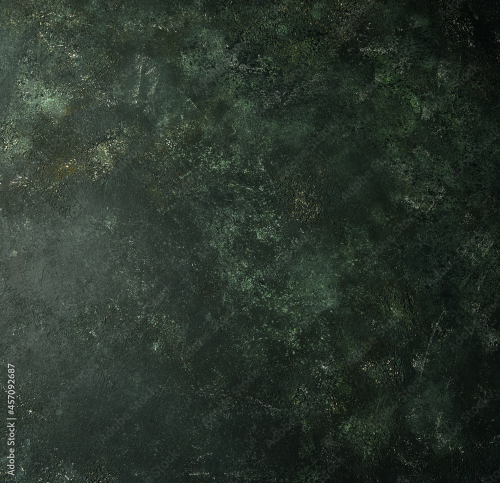Naklejka premium Beautiful dark green background. Panoramic abstract decorative dark background. Wide-angle rough stylized wallpaper with mystical texture with copy space for design.
