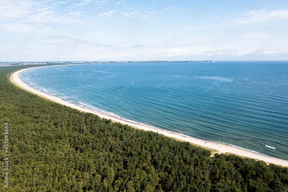 View of the forest and the sea from the drone. Aerial sea landscape.