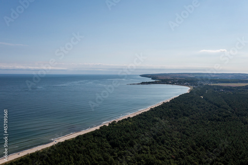 View of the forest and the sea from the drone. Aerial sea landscape.