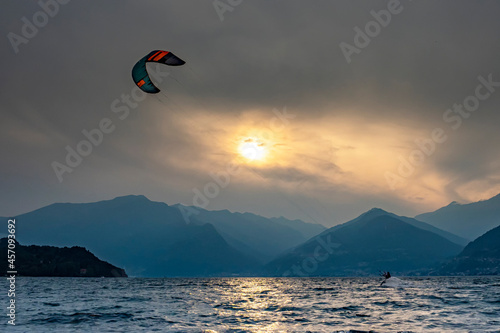 Kitesurfing scene at sunset on Lake Como