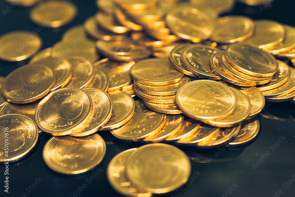 Gold coins stacks is representing riches and wealth management. Coin stack growing and find out the way to get a return on investment. Finance and money exchange investment as concept. Gold coins stacks is representing riches and wealth management. Coin stack growing and find out the way to get a return on investment. Finance and money exchange investment as concept.