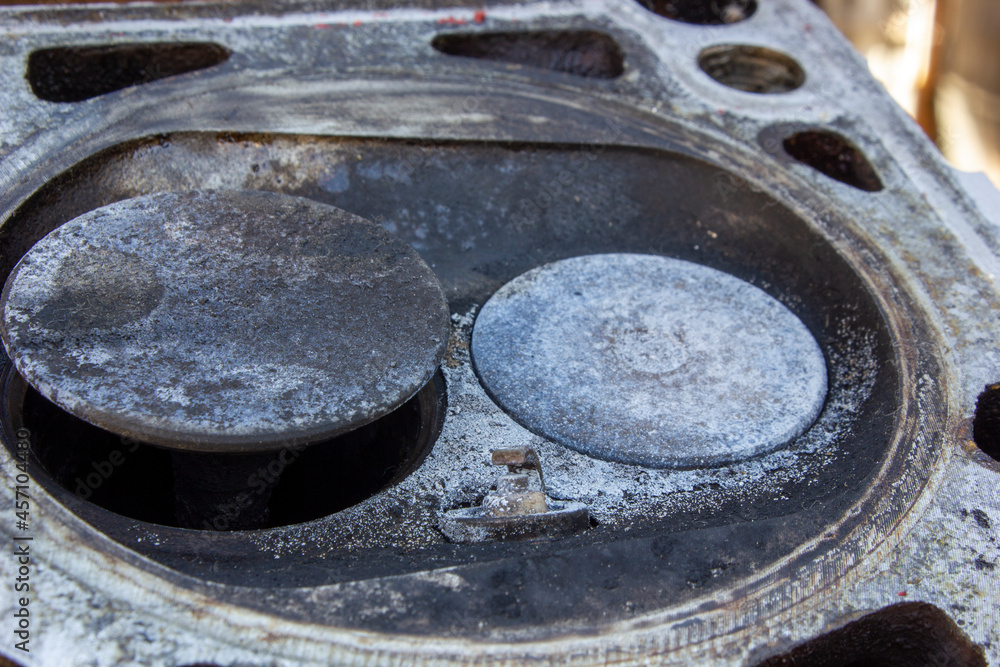 parts of disassembled engine, which was operated for a long time parts of disassembled engine, which was operated for a long time