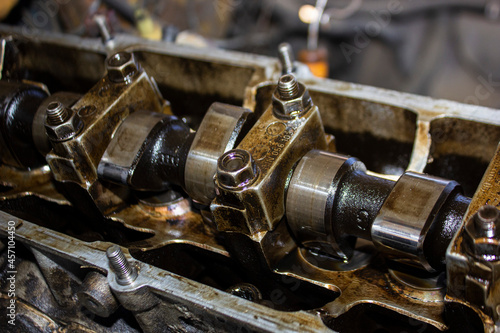 parts of disassembled engine, which was operated for a long time