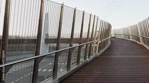 architectural detail of a modern wooden and metal bridge