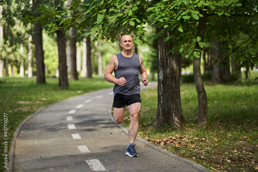 Long distance runner training in the park