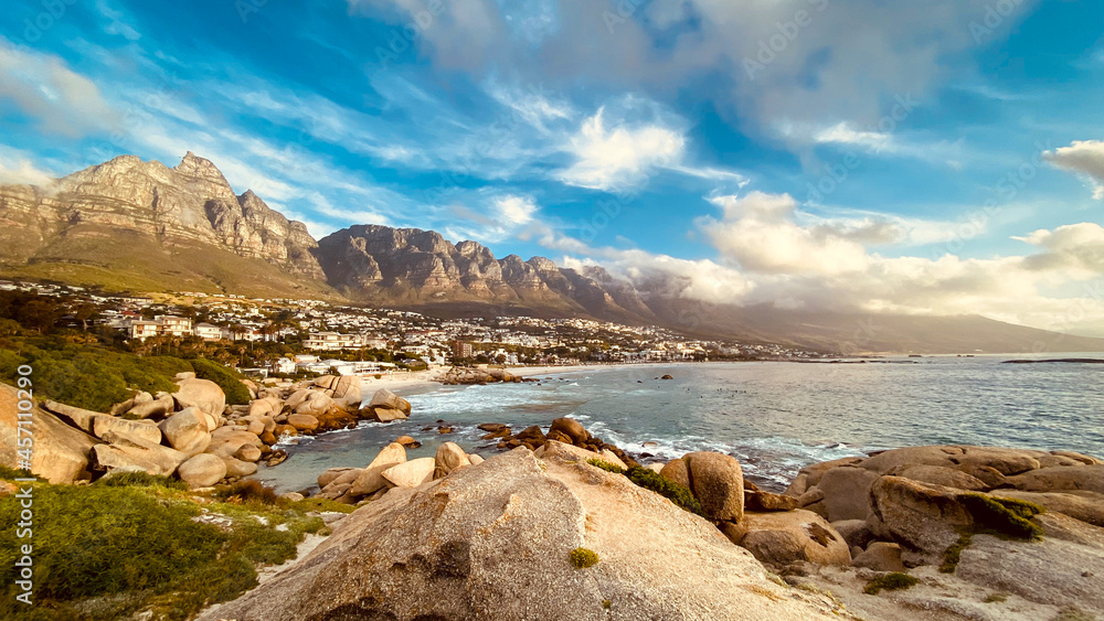 Scenic view of Camps Bay, South Africa with twelve apostles in the background. Scenic view of Camps Bay, South Africa with twelve apostles in the background.