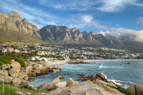 Scenic view of Camps Bay, South Africa with twelve apostles in the background. photo