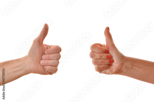 Man and woman hands with thumbs up
