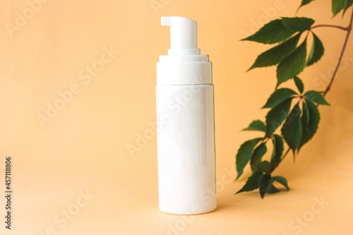 Plastic white container with pump dropper for cleansing foam or Face cleanser. 