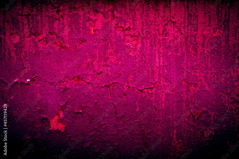 Old red wall in spots, cracks, stains. Painted concrete wall in abstract grunge style loft. Vintage wall background texture for backgrounds, portraits, posters. - obrazy, fototapety, plakaty 