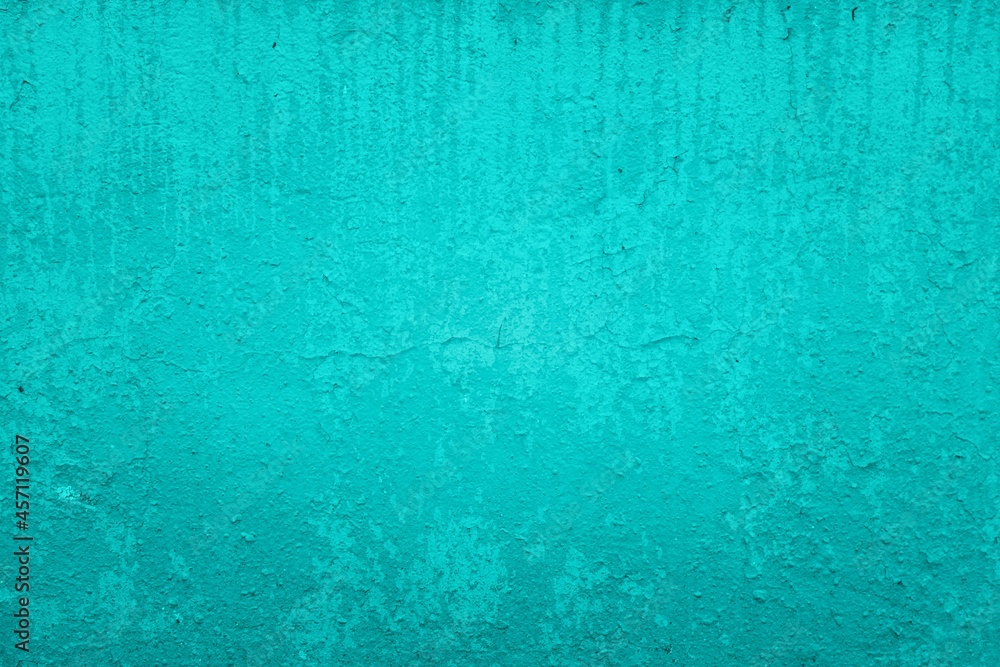 Old green wall in spots, cracks, stains. Painted concrete wall in abstract grunge style loft. Vintage wall background texture for backgrounds, portraits, posters. Old green wall in spots, cracks, stains. Painted concrete wall in abstract grunge style loft. Vintage wall background texture for backgrounds, portraits, posters.