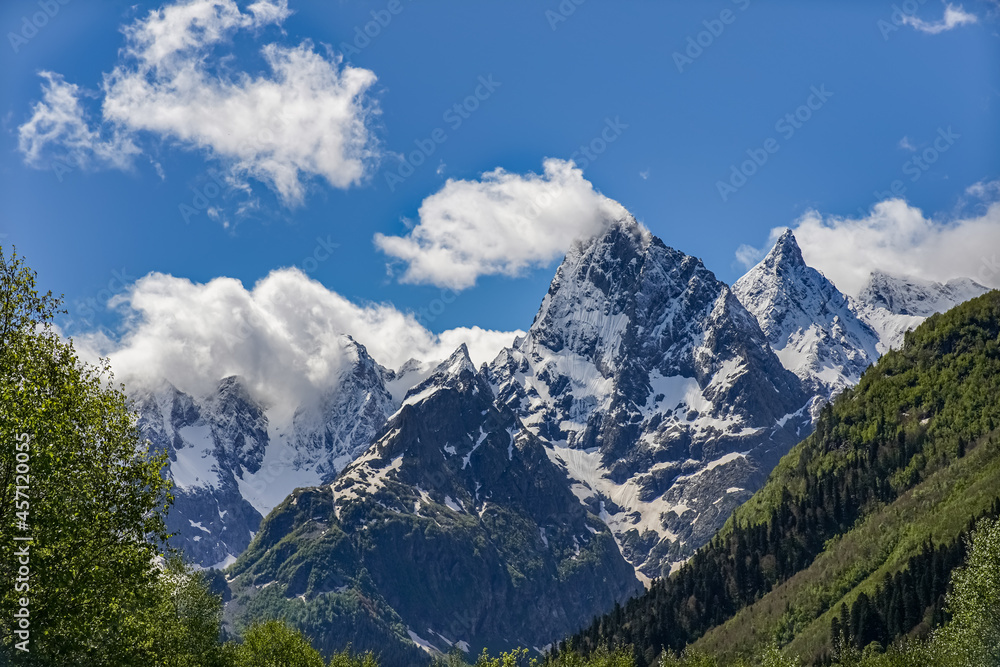 Chotcha Mountain Peak Covered with Snow in Teberda Nature Reserve on Clear Sunny Day