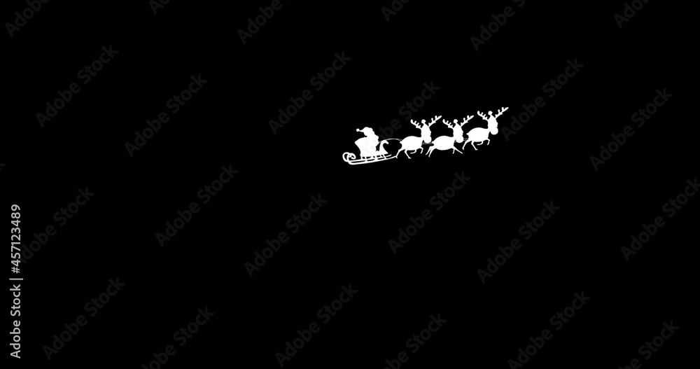 Digital image of silhouette of santa claus in sleigh being pulled by reindeers