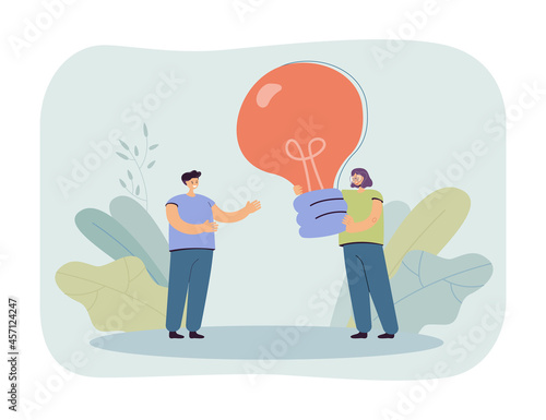 Cartoon woman giving giant lightbulb to man. Female character helping male with ideas flat vector illustration. Teamwork, inspiration, startup concept for banner, website design or landing web page