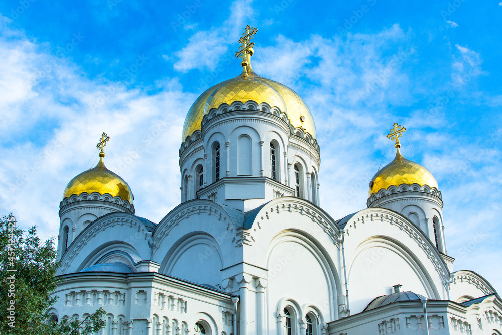 Diveevo, Russia. June 12, 2021. Orthodox church with golden domes with crosses. Christian temple.